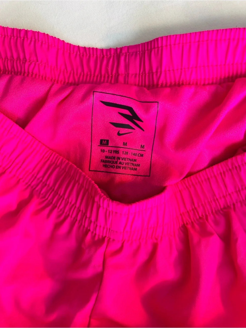 Nike Girls, Size Medium, Hot Pink Running Shorts with White Outline